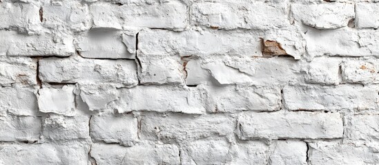 White brick wall with a distressed texture suitable for various industrial and modern background applications