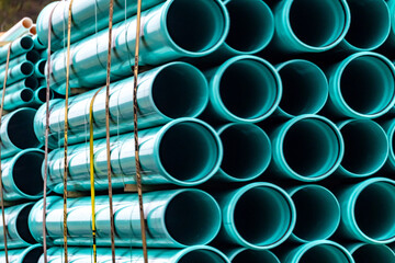Green Industrial piping in Transit on a Semi
