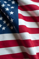 Obraz premium American flag textile close-up view fabric texture patriotism indoor setting visual representation of freedom