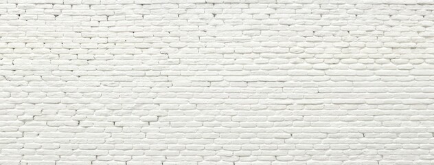 Obraz premium White brick wall with masonry pattern of painted stone and concrete.