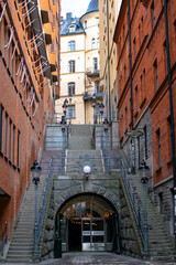 historic stone staircase between buildings in stockholm