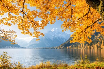 Autumnal Alpine lake view, golden leaves framing mountain, idyllic postcard