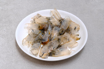 Shrimps shell on the white plate
