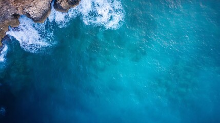Aerial drone view of a beautiful clear turquoise ocean with rocky coastline : Generative AI