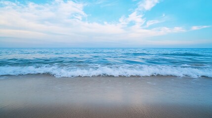 Obraz premium Serene beach landscape with gentle waves and clear blue sky at dusk capturing tranquil ocean vibes : Generative AI