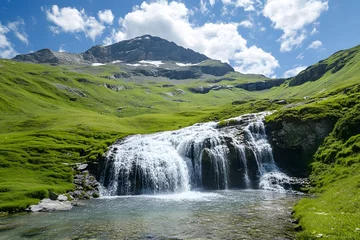 Fototapete Mountain waterfall cascading into pool, sunny alpine meadow © hit.std