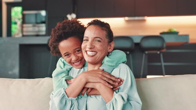 Home, face and mom with boy for hug, safety and bonding together with connection as happy family. People, woman and child in portrait for love embrace, support and mothers day on sofa in house