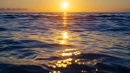Fototapeta premium Breathtaking sunset over the ocean with shimmering waves reflecting golden hues in serene waters : Generative AI