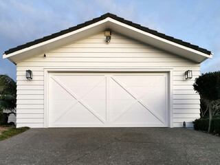 Modern White Garage with Double Doors with Black Tile Roof - Residential Exterior
