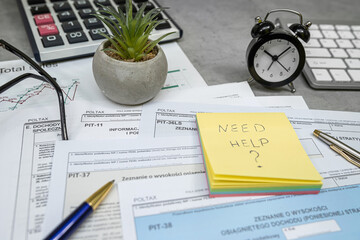 Pit 38 37 form, annual tax return with pen calculator on desk. Time for tax