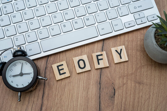 EOFY, End of Financial Year with laptop keyboard on desk