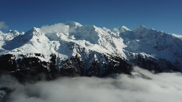 mountains with thick layers of snow covered in Alpes-Belledonne, France