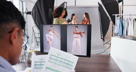 Photography, editor and model with people in studio for branding campaign, athleisure fashion line or promotion. Behind the scenes, ecommerce photoshoot or media launch with team on set for project