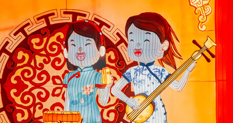 Beijing, China. Zigong Lantern Festival In Beijing. Amazing Glowing Lanterns In Form Of Musicians Singing Musicians Playing Sanxian And Paiban. Lantern Festival In Beijing Garden Expo Park. National