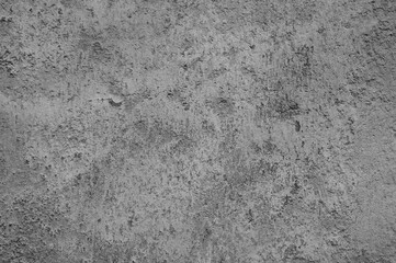 gray background, photo shows texture of gray wall close-up
