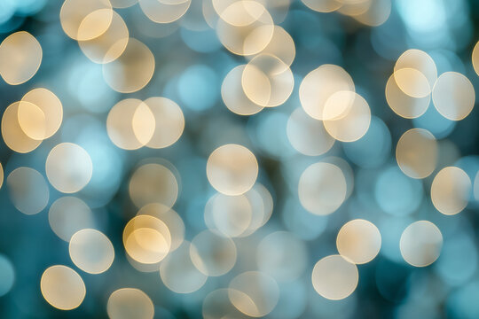 Soft white bokeh circles on a light blue abstract background, perfect for elegant designs, festive event visuals, and dreamy digital backdrops with a gentle blur effect