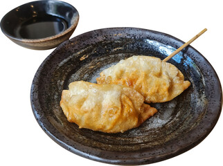 Gyoza dumplings Skewer with dipping sauce neatly on a transparent background