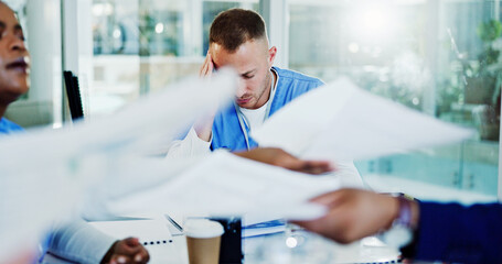Frustrated man, nurse and documents with headache for pressure, overworked stress or anxiety at...