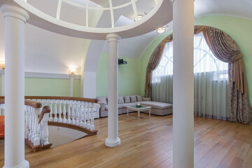 Neoclassical interior of the living room of a luxurious mansion. Rotunda in the interior. Large...