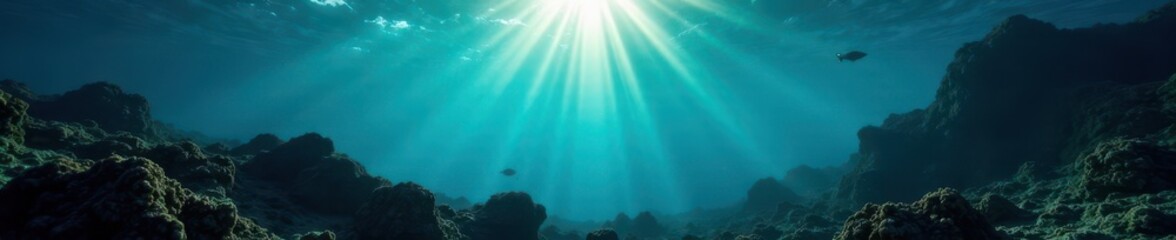 Fototapeta premium Silhouetted reef, beams of sunlight penetrate water, contrast, golden hour, gold