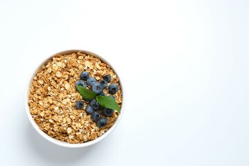Delicious granola with berries on a white background