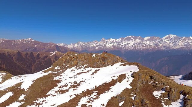 Captured in breathtaking detail, summit of dayara bgya winetr trk, showcasing the natural beauty and scenic wonders of the region.