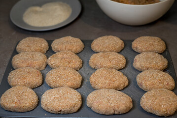 Homemade cutlets before cooking, preparation for freezing, homemade food preparations