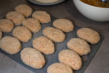 Homemade cutlets before cooking, preparation for freezing, homemade food preparations