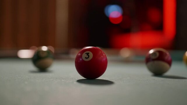 red ball number three on the billiard table