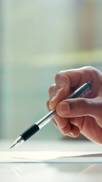 Pen, hand and person checking contract for financial agreement, registration or loan application. Information, terms and conditions with insurance agent reading legal document, business plan or deal