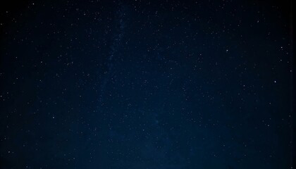 Obraz premium Atmospheric scene of a pitch-black sky adorned with a stunning constellation of stars