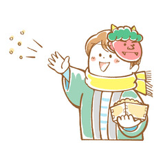 節分に鬼に豆をまく男の子