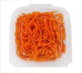 Korean spicy carrot salad in container isolated on white background . top view .