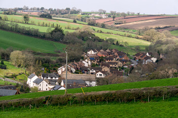 A small settlement on the slopes and meadows of Devon, England, Europe.