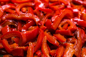 Stripes of grilled paprika, background. Healthy food concept.