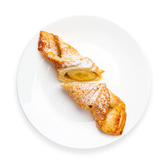 Puff pastry with banana on a plate, top view, white background, isolate.