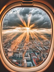 Stunning sunset view from an airplane window, showcasing cityscape below
