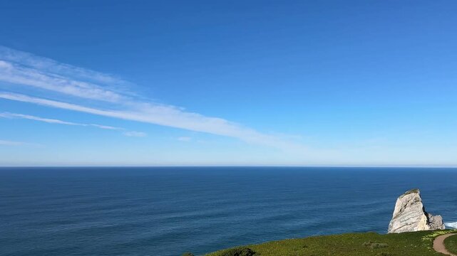 The endless horizon line of the Atlantic Ocean at the lighthouse of Caba da Roca