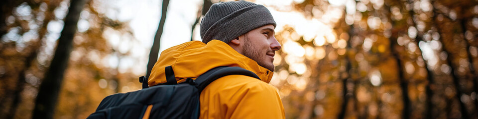 Man with Backpack in Autumn Forest