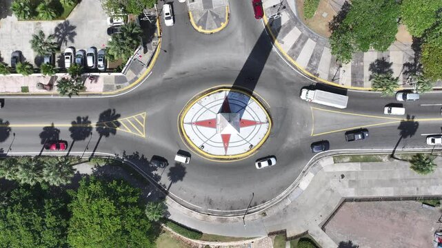 Santo Domingo, Dominican Republic, aerial video top view, hovering above Obelisk Santo Domingo, at roundabout Av. George Washington (Malec&oacute;n) and P.&ordm; Pdte. Billini, 4k aerial video footage