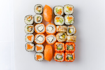 Delightful Arrangement of a Vibrant Sushi Set Showcasing Fresh Ingredients on a Pristine White Background in a Culinary Masterpiece