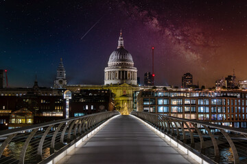 Millennium Bridge leading to St Paul's Cathedral in London at night