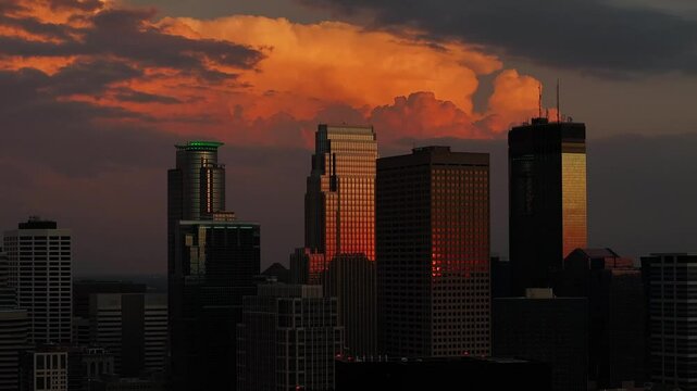 Drone footage of a beautiful skyline with clouds during sunset in the summer