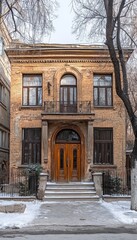 Facade of an Elegant Historic Art Nouveau Building in Kyiv, Ukraine on a Snowy Winter Day