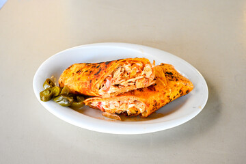 Lavash zurna doner kebab ( zurna  durum )  or shawarma sliced in plate isolated.  hatay usulu tavuk Et doner durum. Gobit ekmek arasi doner. Pilavustu iskender doner kebap. 