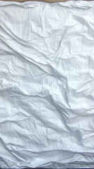 Obraz premium White crumpled aluminum foil forms an abstract geometric pattern, providing a unique and dreamy landscape backdrop suitable for wallpapers and various design applications