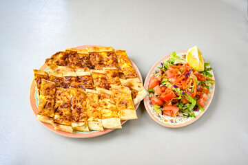Kiymali pide. Turkish pide with minced meat. Turkish pizza mince pita Pide on white background. Etli ekmek. Kusbasi kasarli, kiymali kasarli, kiymali yumurtali, Bafra, Trabzon, Kusbasili pide.