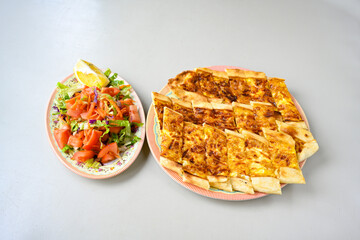 Kiymali pide. Turkish pide with minced meat. Turkish pizza mince pita Pide on white background. Etli ekmek. Kusbasi kasarli, kiymali kasarli, kiymali yumurtali, Bafra, Trabzon, Kusbasili pide.