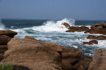 waves, rocks and boulders located on Renote Island in the commune of Trégastel, on The Pink Granite Coast in Brittany, France