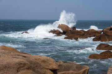 waves, rocks and boulders located on Renote Island in the commune of Trégastel, on The Pink Granite Coast in Brittany, France